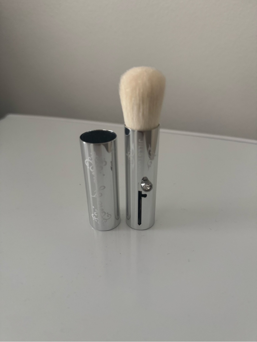 Jill Stuart Silver Makeup Brush with Cream Bristles
